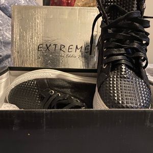 Black spike sneakers